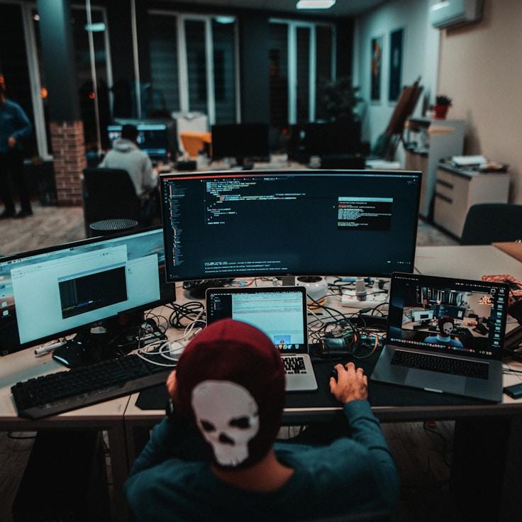 Mobile app project planning workspace with devices and development tools